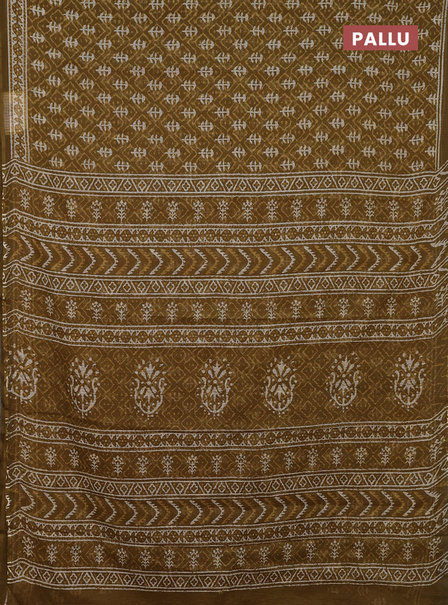 Kota doria saree mehendi green with allover dabu prints and printed border