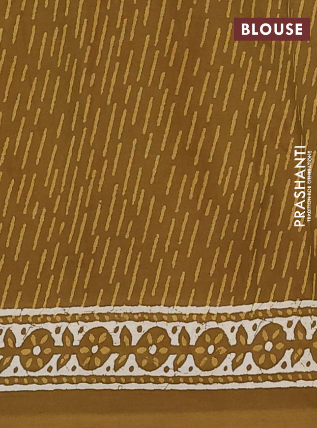 Kota doria saree mehendi green with allover dabu prints and printed border