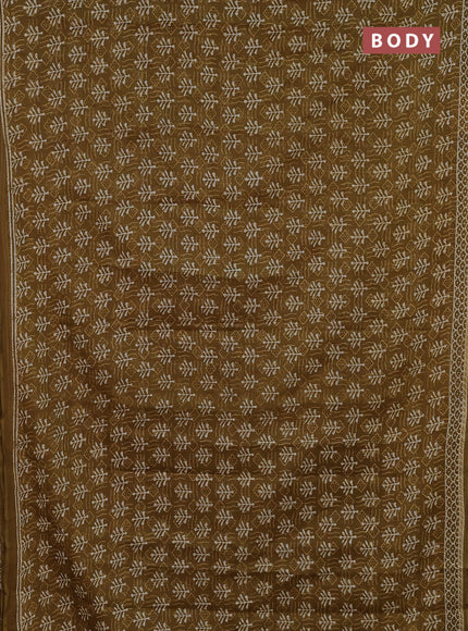 Kota doria saree mehendi green and off white with allover dabu prints and printed border