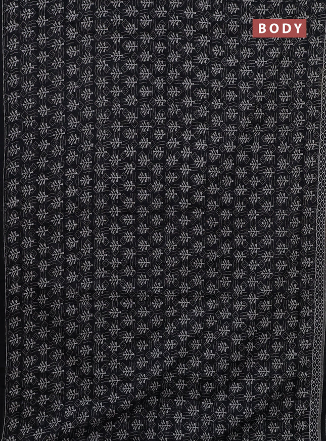 Kota doria saree black and off white with allover dabu prints and printed border