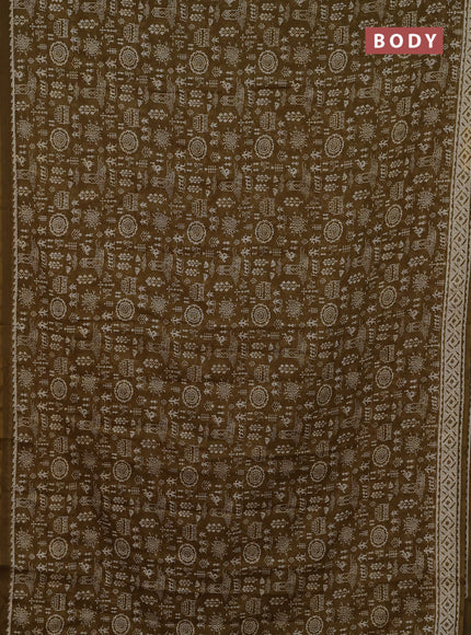 Kota doria saree mehendi green and cream with allover warli prints and printed border