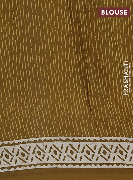 Kota doria saree mehendi green and cream with allover warli prints and printed border