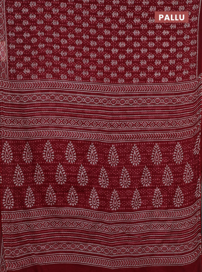 Kota doria saree maroon with allover dabu prints and printed border