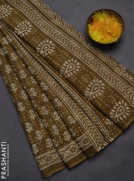 Kota doria saree mehendi green with allover dabu prints and printed border
