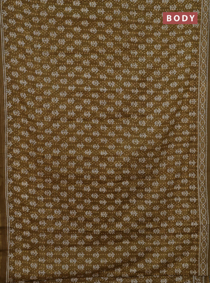 Kota doria saree mehendi green with allover dabu prints and printed border