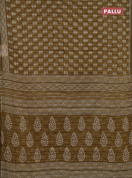 Kota doria saree mehendi green with allover dabu prints and printed border