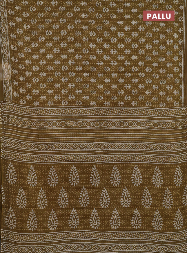 Kota doria saree mehendi green with allover dabu prints and printed border