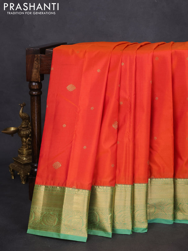 Bangalori silk saree orange and green shade with zari woven buttas and zari woven border and Butta style