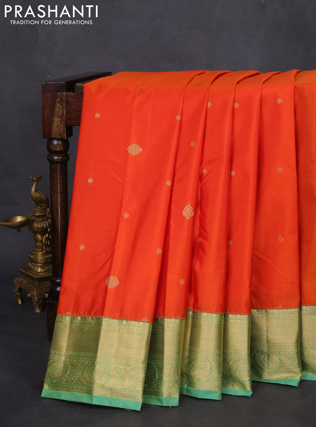 Bangalori silk saree orange and green shade with zari woven buttas and zari woven border and Butta style