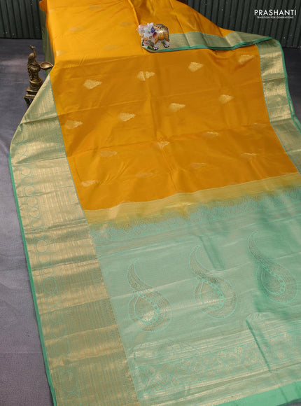 Bangalori silk saree mustard yellow and teal green with zari woven buttas and long zari woven border and Butta style