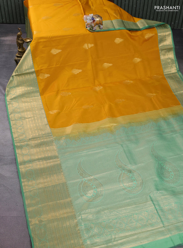 Bangalori silk saree mustard yellow and teal green with zari woven buttas and long zari woven border and Butta style