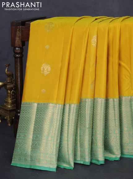 Bangalori silk saree yellow and teal green shade with zari woven buttas and long zari woven border and Butta style