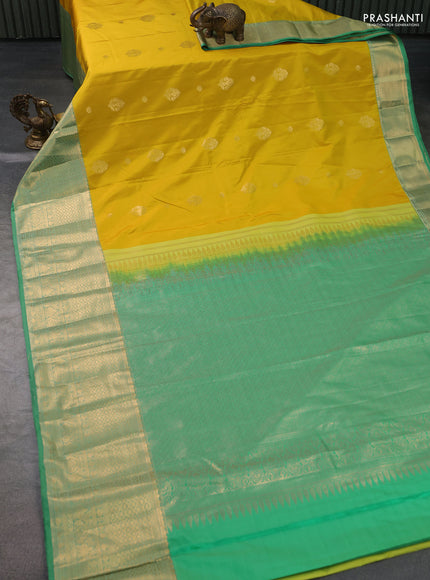 Bangalori silk saree yellow and teal green shade with zari woven buttas and long zari woven border and Butta style