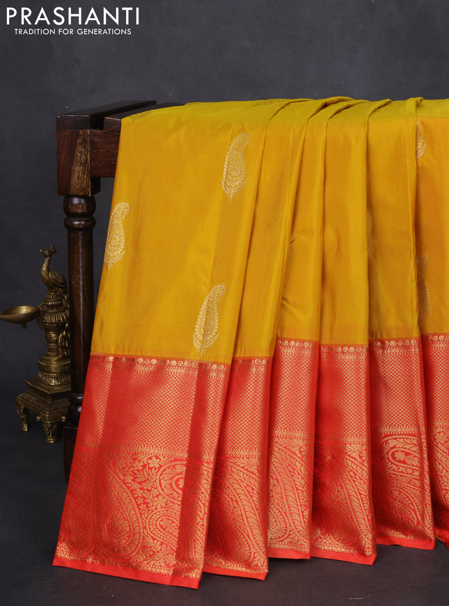 Bangalori silk saree mustard yellow and orange with paisley zari woven buttas and long zari woven border and Butta style