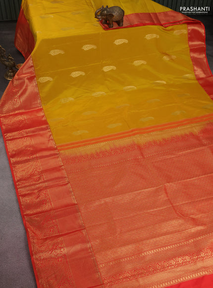 Bangalori silk saree mustard yellow and orange with paisley zari woven buttas and long zari woven border and Butta style