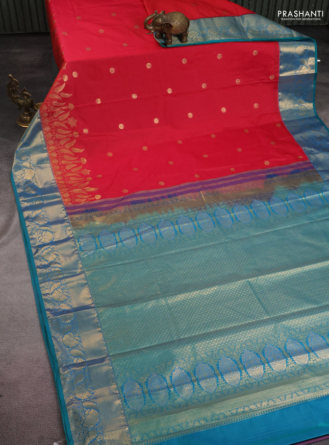 Bangalori silk saree dual shade of reddish pink and dual shade of teal greenish blue with zari woven buttas and long zari woven border and Butta style