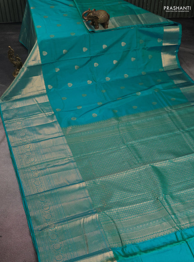Bangalori silk saree teal blue with zari woven buttas and long zari woven border and Butta style