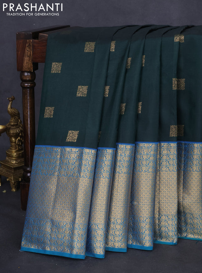 Bangalori silk saree bottle green and teal blue with allover zari woven buttas and long zari woven border and Butta style