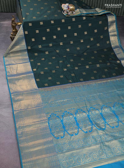 Bangalori silk saree bottle green and teal blue with allover zari woven buttas and long zari woven border and Butta style