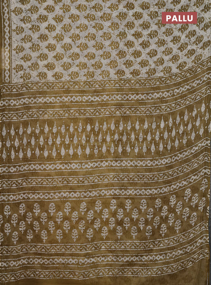 Kota doria saree off white and mehendi green with allover butta prints and printed border