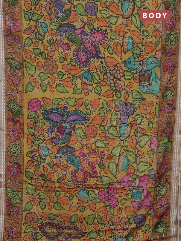 Semi tussar saree mustard yellow and dark mustard with allover kalamkari prints and printed border