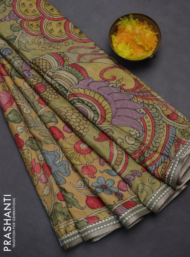 Semi tussar saree mustard yellow and pastel green with allover kalamkari prints and printed border
