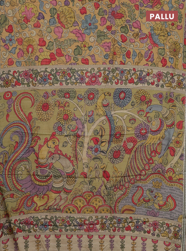Semi tussar saree mustard yellow and pastel green with allover kalamkari prints and printed border