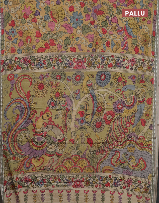 Semi tussar saree mustard yellow and pastel green with allover kalamkari prints and printed border