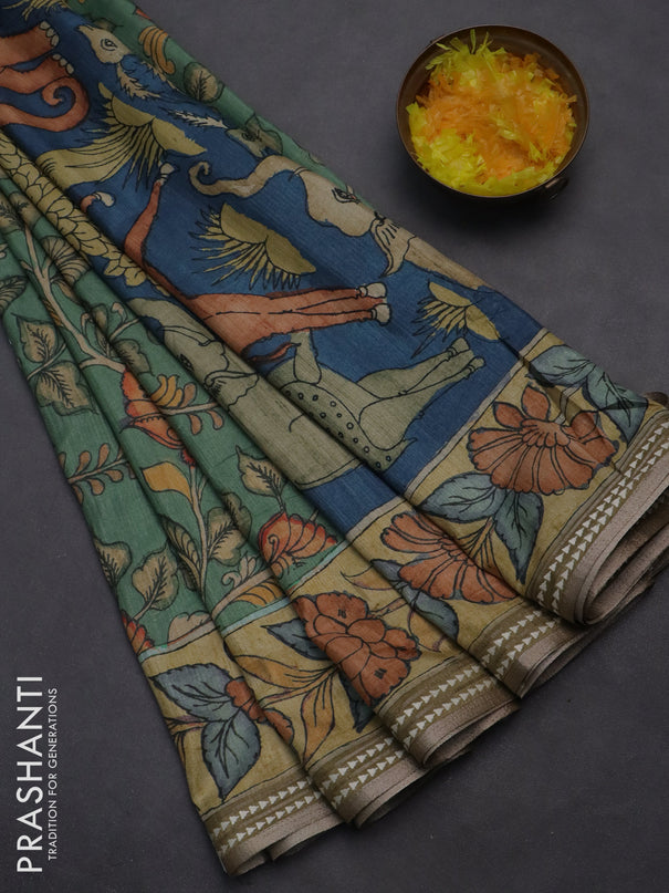 Semi tussar saree green and mustard yellow with allover kalamkari prints and printed border