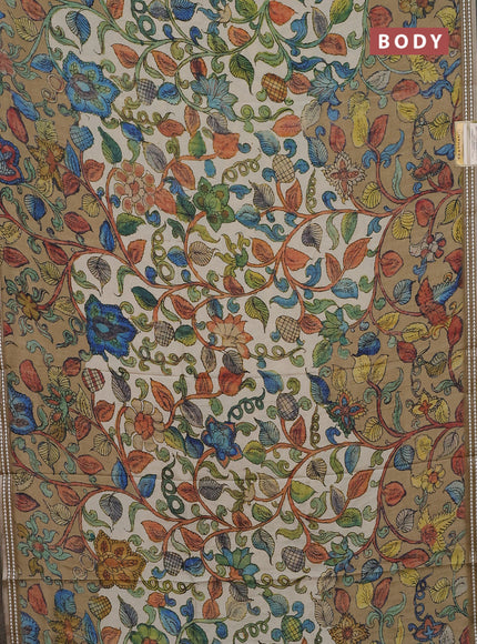 Semi tussar saree cream and mehendi green with allover kalamkari prints and printed border