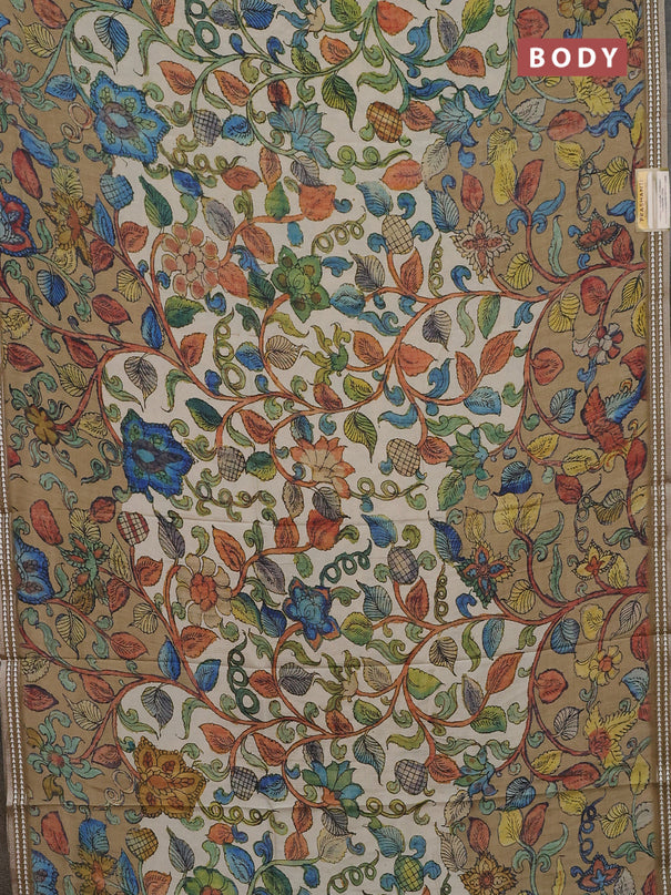 Semi tussar saree cream and mehendi green with allover kalamkari prints and printed border