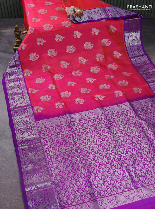 Venkatagiri silk saree dual shade of pinkish orange and purple with silver zari woven buttas and silver zari woven border