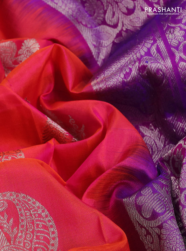 Venkatagiri silk saree dual shade of pinkish orange and purple with silver zari woven buttas and silver zari woven border