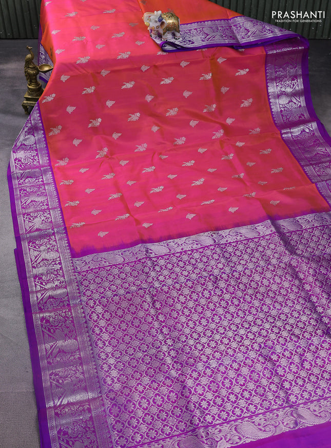 Venkatagiri silk saree dual shade of pinkish orange and purple with silver zari woven buttas and silver zari woven border