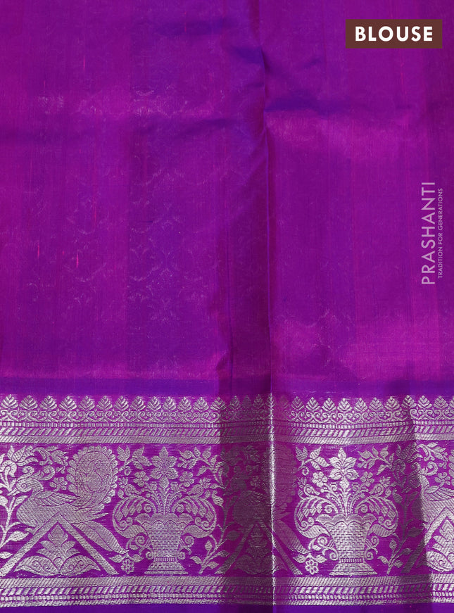 Venkatagiri silk saree dual shade of pinkish orange and purple with silver zari woven buttas and silver zari woven border