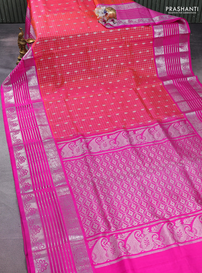 Venkatagiri silk saree dual shade of pinkish orange and pink with allover silver zari checks & buttas and long silver zari woven border