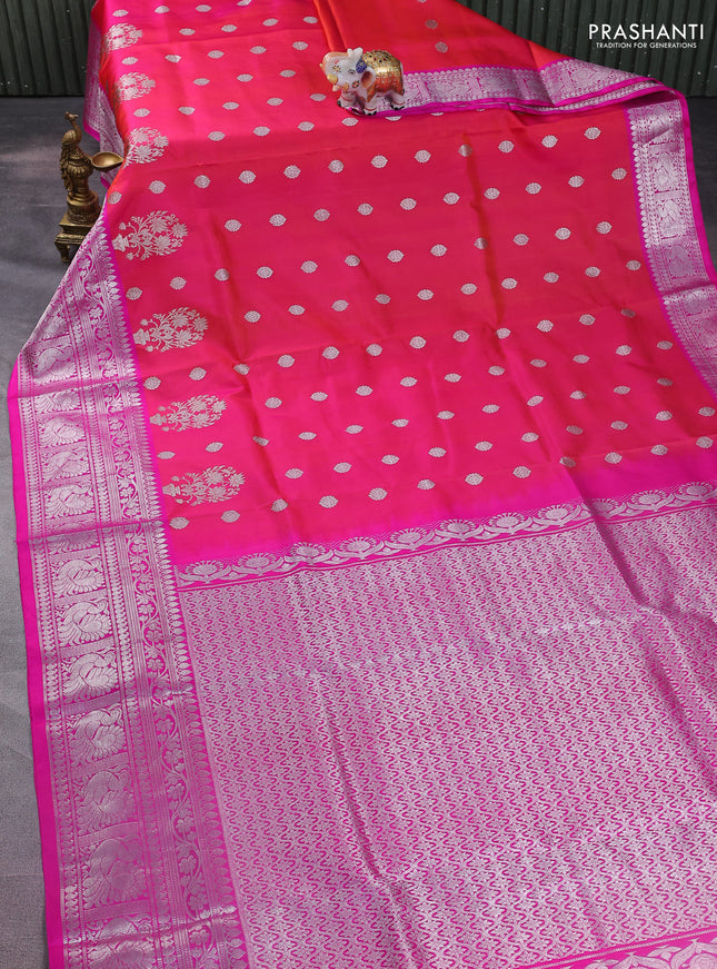 Venkatagiri silk saree dual shade of pinkish orange and pink with silver zari woven buttas and long silver zari woven border