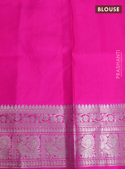 Venkatagiri silk saree dual shade of pinkish orange and pink with silver zari woven buttas and long silver zari woven border