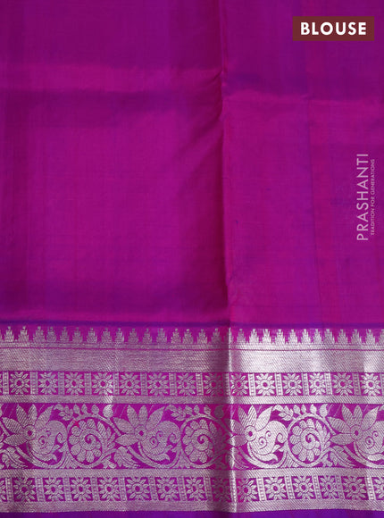 Venkatagiri silk saree dual shade of pinkish orange and purple with silver zari woven buttas and rich silver zari woven border