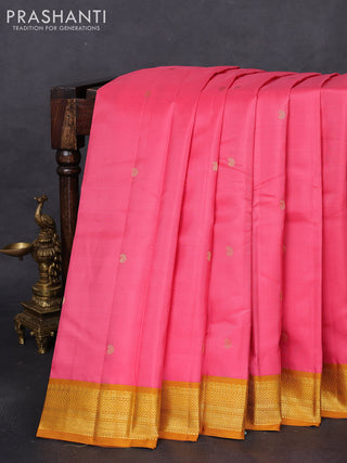 Pure kanchipuram silk saree peach pink and dark mustard with zari woven buttas and zari woven korvai border