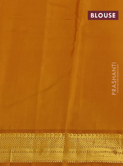 Pure kanchipuram silk saree peach pink and dark mustard with zari woven buttas and zari woven korvai border