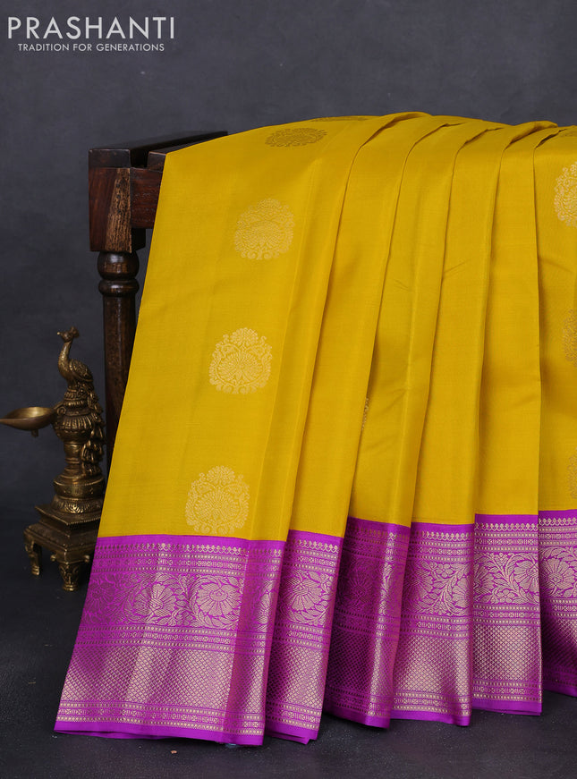 Pure kanchipuram silk saree yellow and purple with zari woven buttas and zari woven korvai border