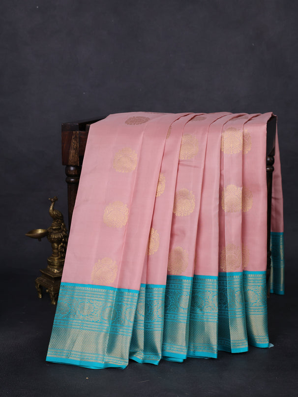 Pure kanchipuram silk saree pastel peach and teal blue with zari woven buttas and zari woven korvai border