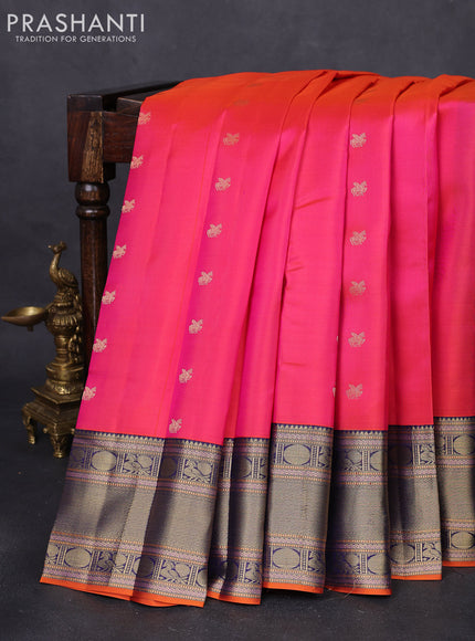 Pure kanchipuram silk saree dual shade of pinkish orange and navy blue with zari woven buttas and zari woven border