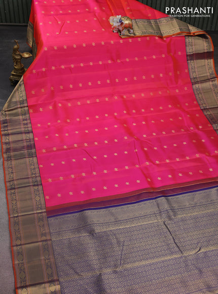 Pure kanchipuram silk saree dual shade of pinkish orange and navy blue with zari woven buttas and zari woven border