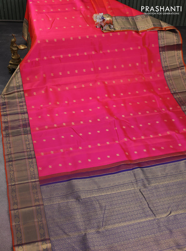 Pure kanchipuram silk saree dual shade of pinkish orange and navy blue with zari woven buttas and zari woven border