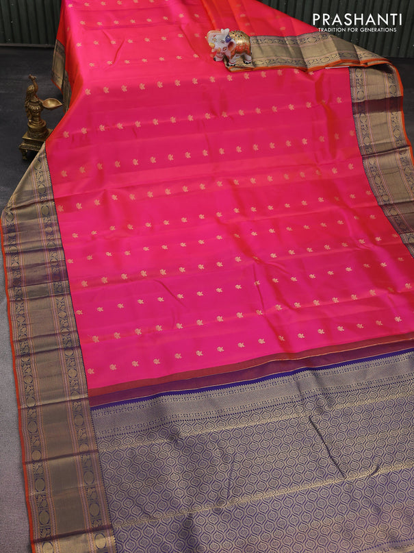 Pure kanchipuram silk saree dual shade of pinkish orange and navy blue with zari woven buttas and zari woven border