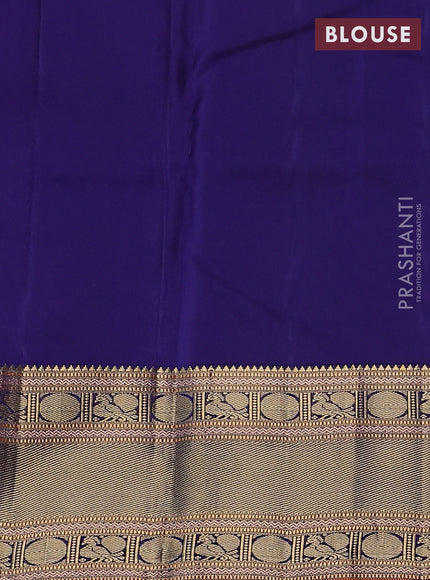 Pure kanchipuram silk saree dual shade of pinkish orange and navy blue with zari woven buttas and zari woven border