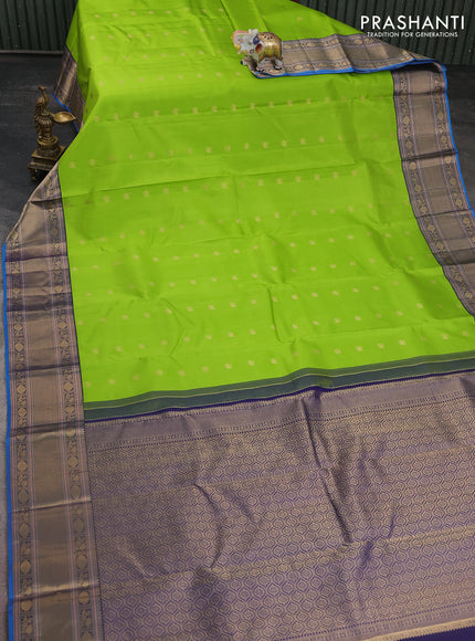 Pure kanchipuram silk saree light green and navy blue with zari woven buttas and zari woven border