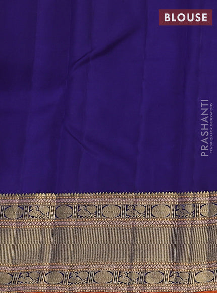Pure kanchipuram silk saree dual shade of pinkish orange and navy blue with zari woven buttas and zari woven border